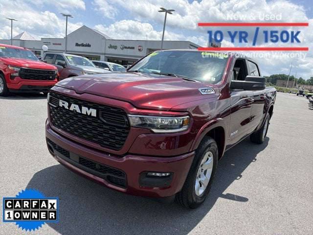 2025 RAM 1500 Big Horn in Delmonico Red Pearlcoat — front three-quarter view