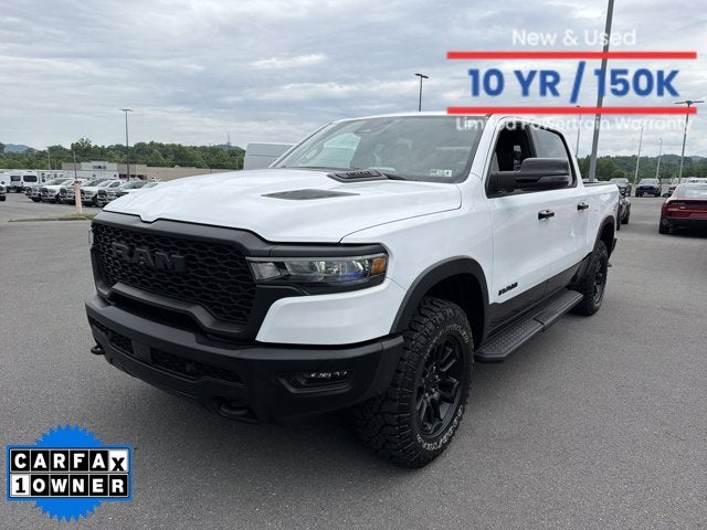 2026 RAM 1500 Rebel in Bright White Clearcoat — front three-quarter view