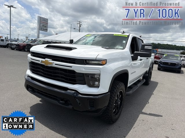 2025 Chevrolet Silverado 2500HD Custom in Summit White — front three-quarter view