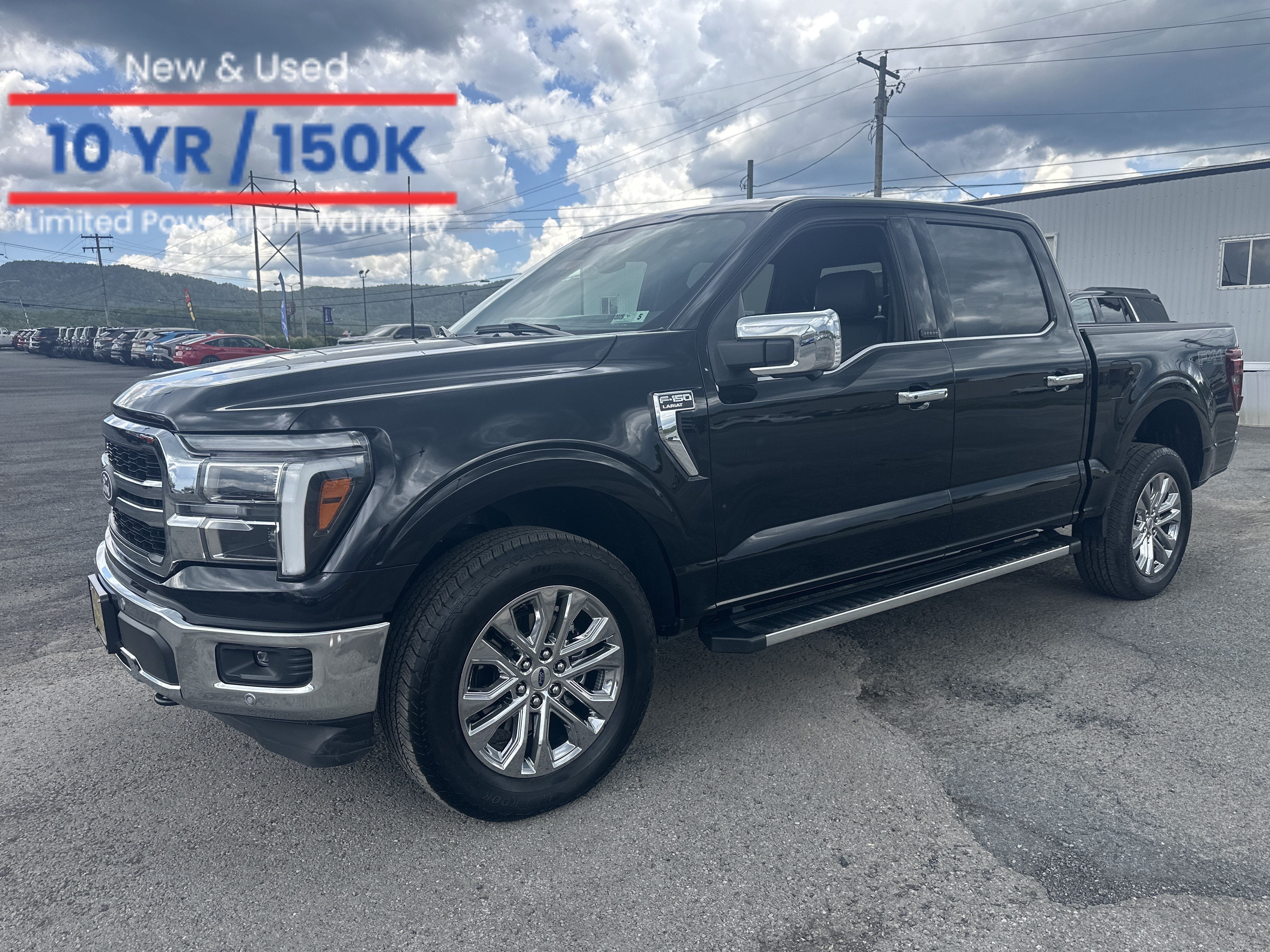 2025 Ford F-150 LARIAT in Black Metallic — front three-quarter view