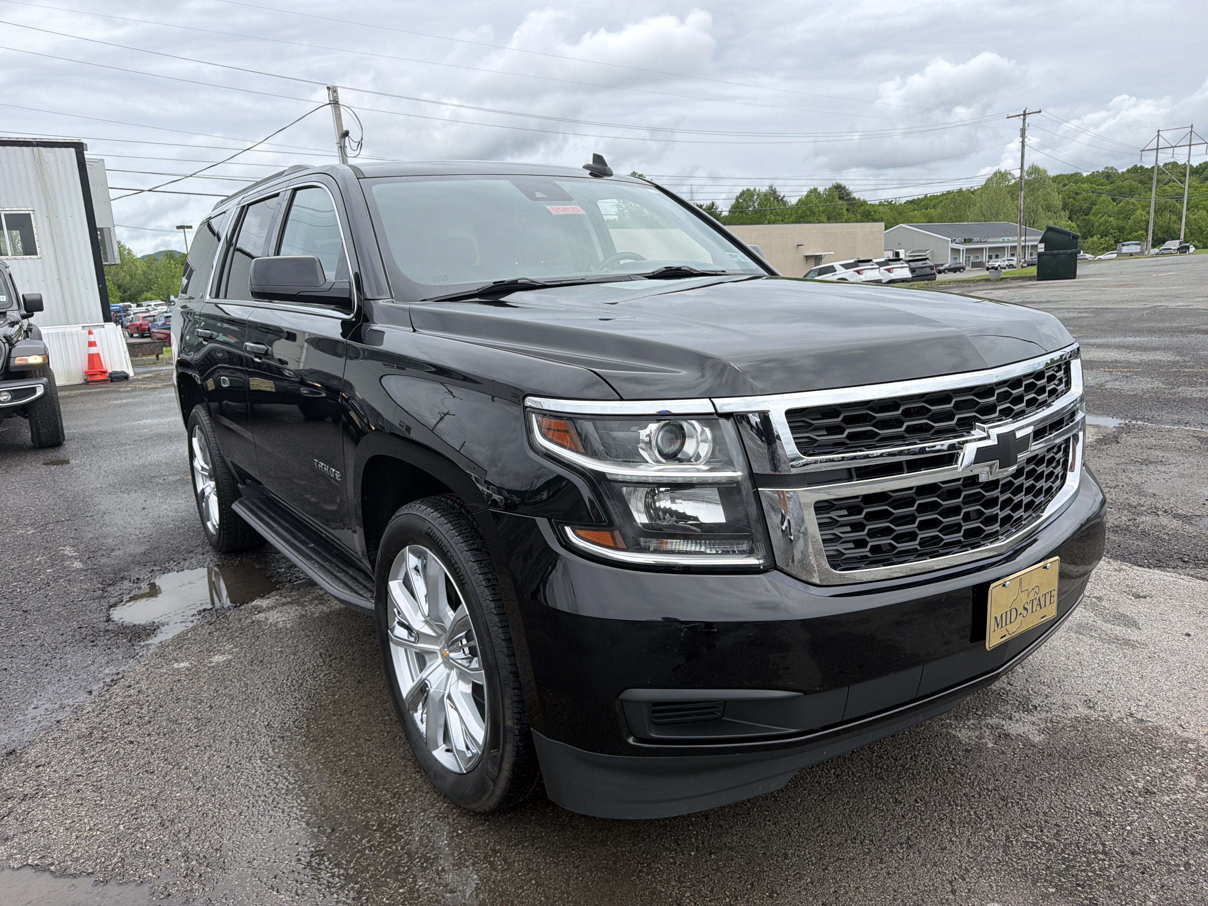 2020 Chevrolet Tahoe LT in Black — front three-quarter view