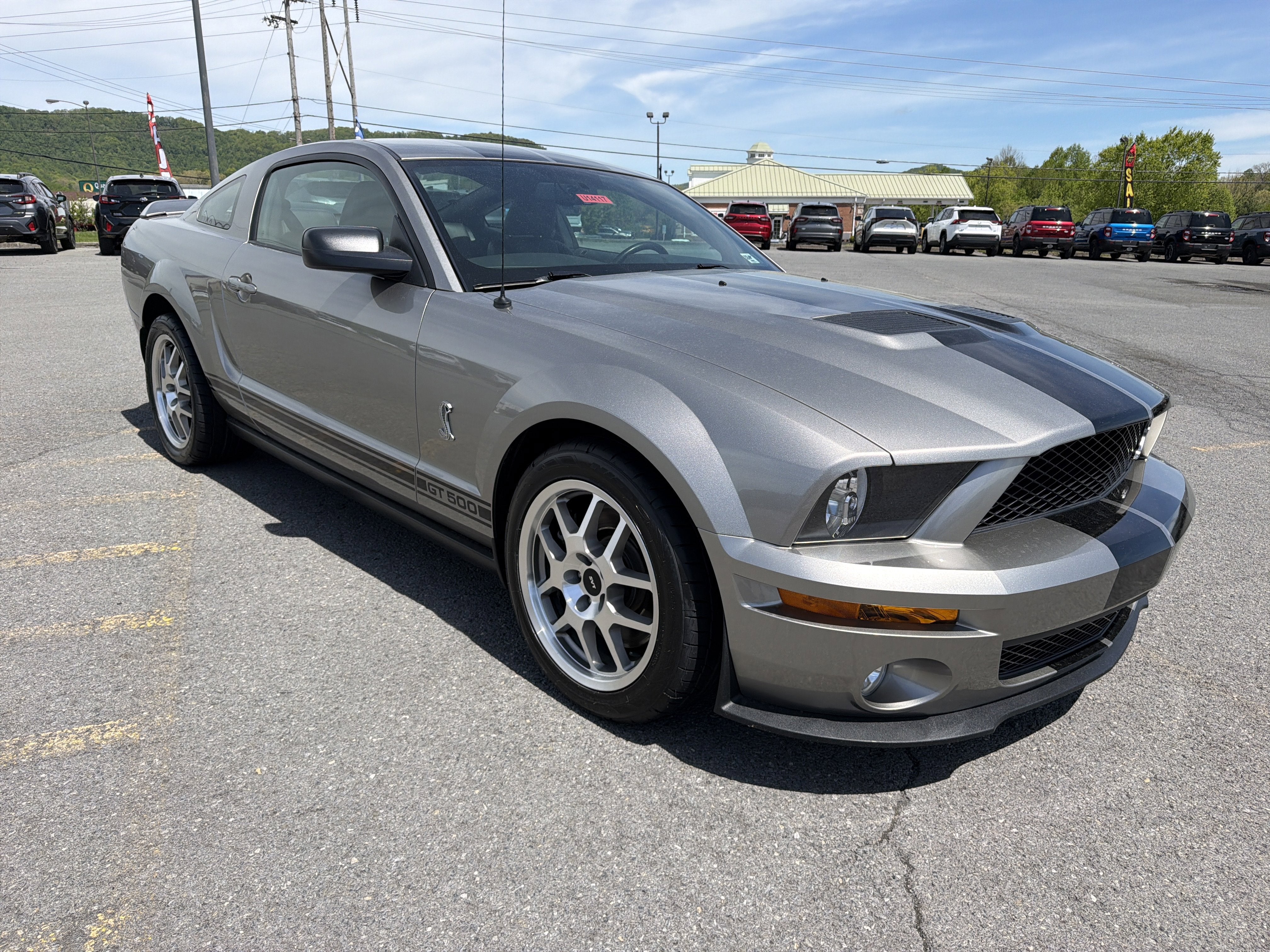 2008 Ford Mustang Shelby GT500 in Silver — front three-quarter view